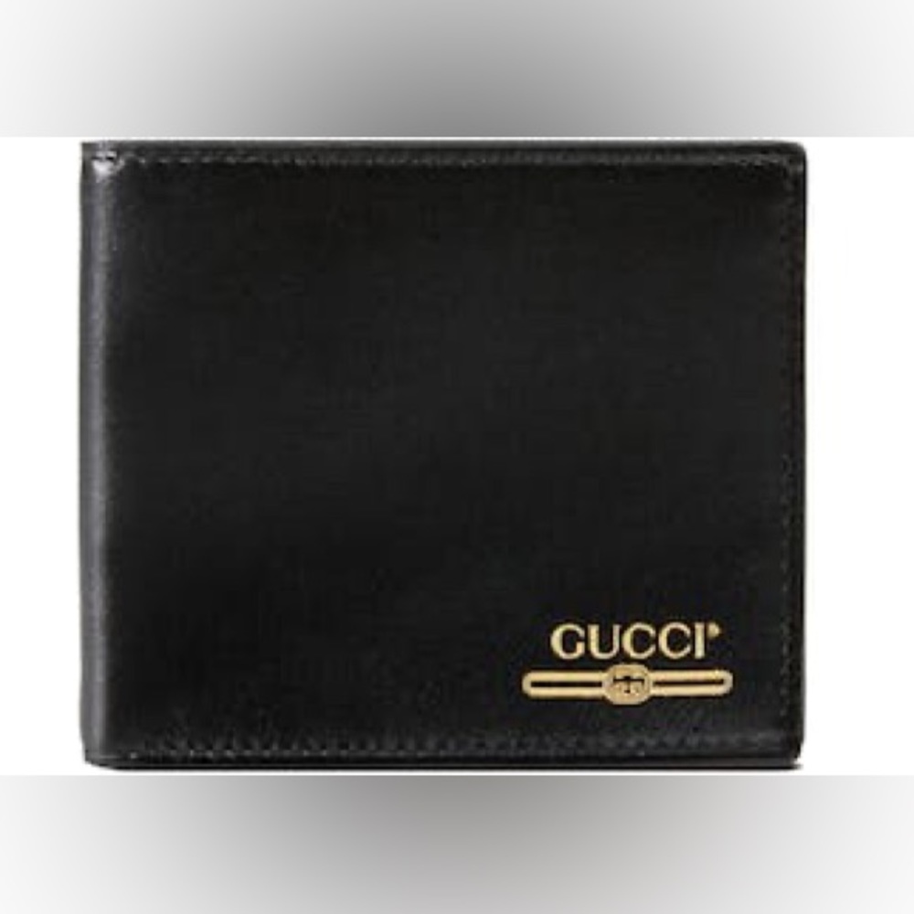 Gucci Black Leather Gold Embossed GG Logo Bifold Wallet. $460